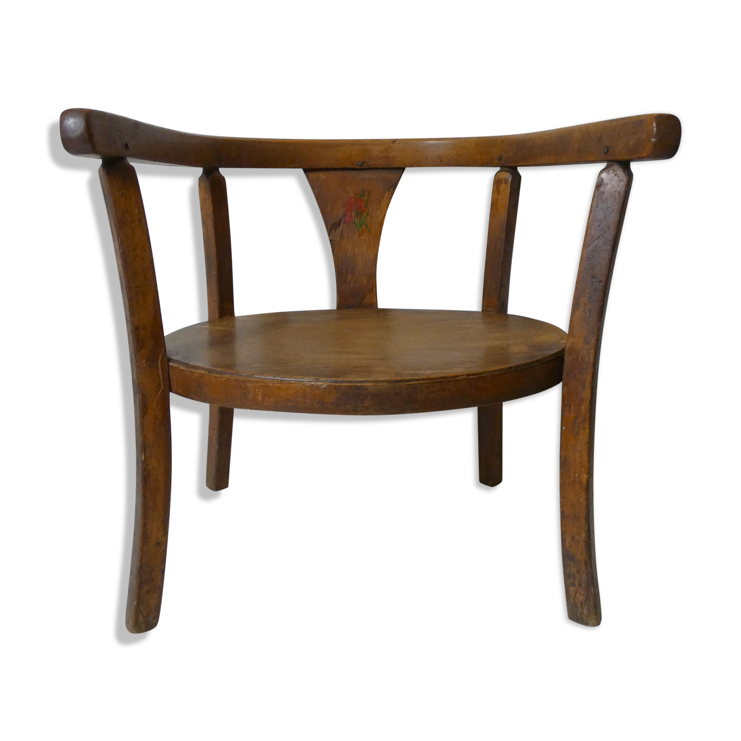 Old wooden armchair for children