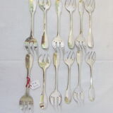 12 silver metal oyster forks