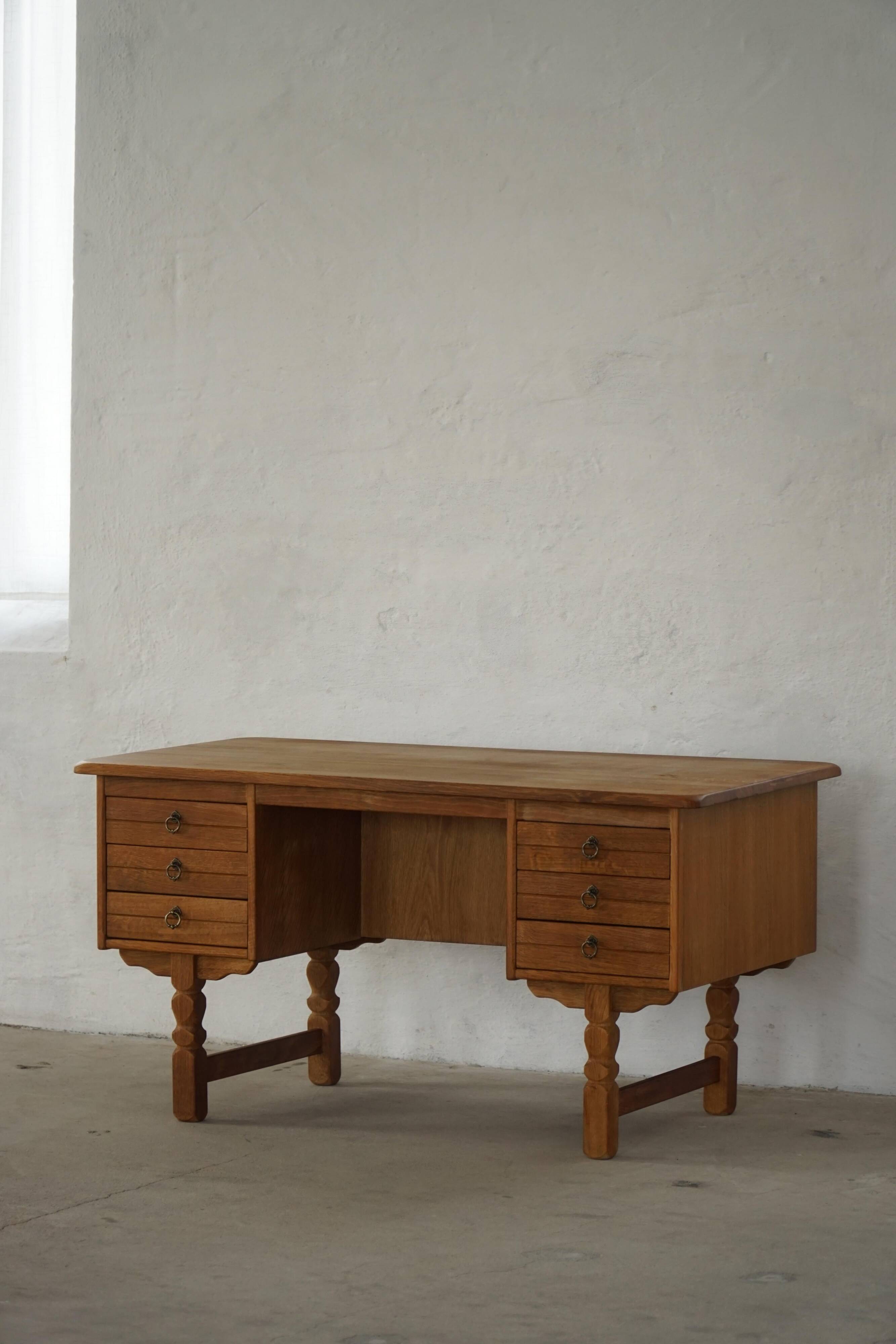 Free-standing desk in Oak by Henning Kjærnulf, Mid-century Danish Modern, 1950s.