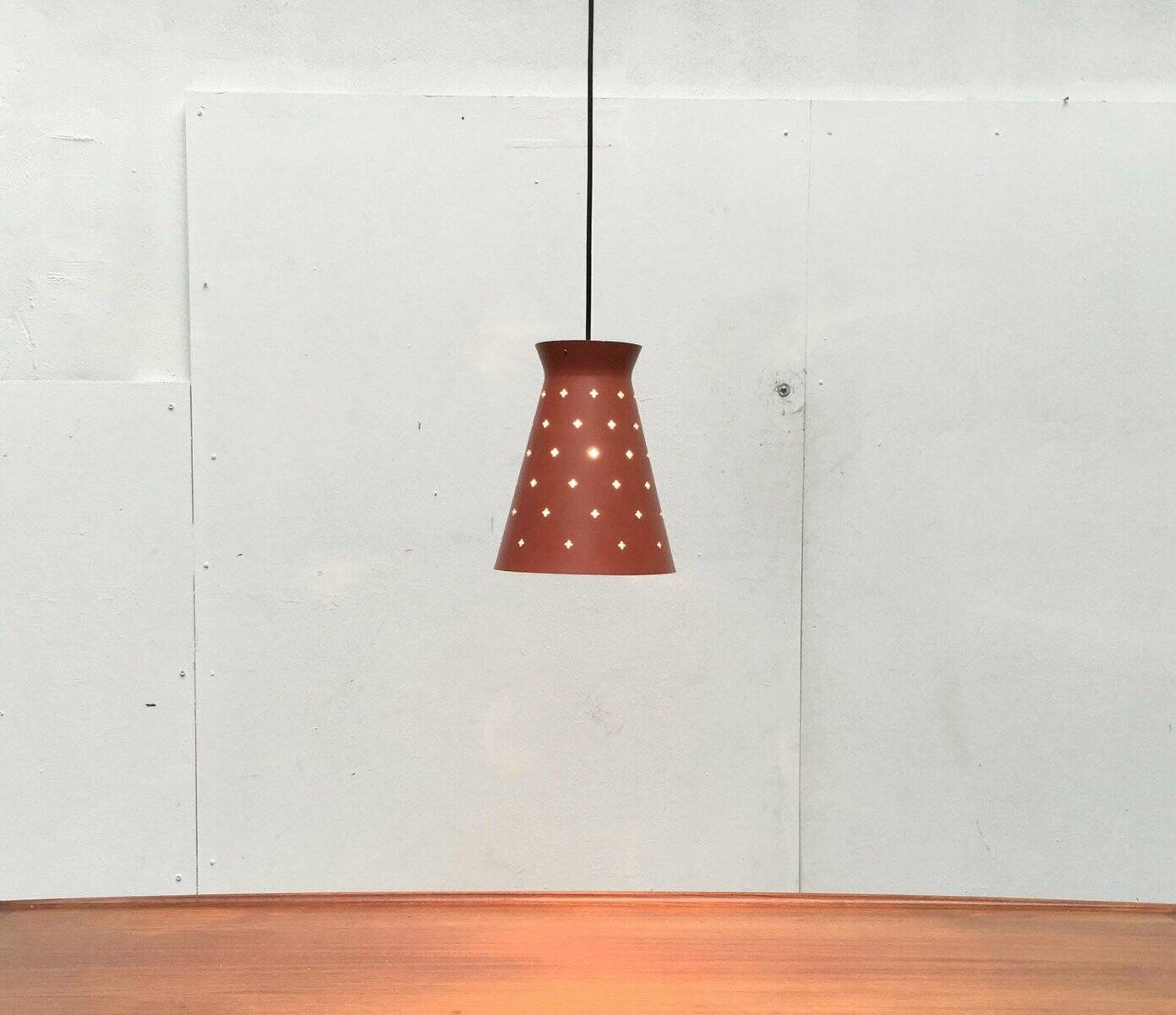 Perforated metal pendant light, mid-century design, 1960s.