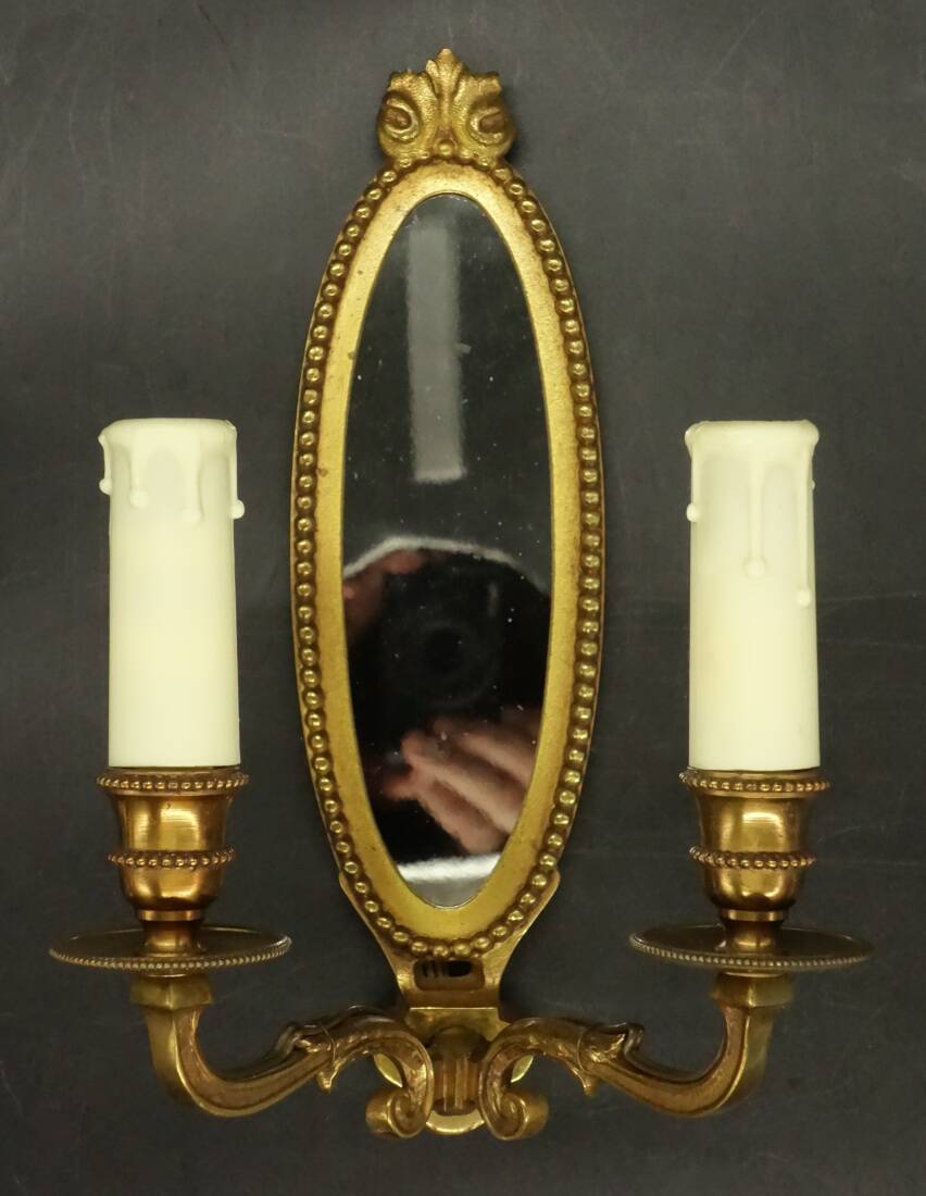 Paire d'appliques-miroirs style Louis XVI - bronze