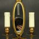 Paire d'appliques-miroirs style Louis XVI - bronze