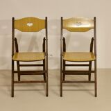 Pair of vintage folding chairs year 50 sculpted backrest.