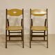 Pair of vintage folding chairs year 50 sculpted backrest.
