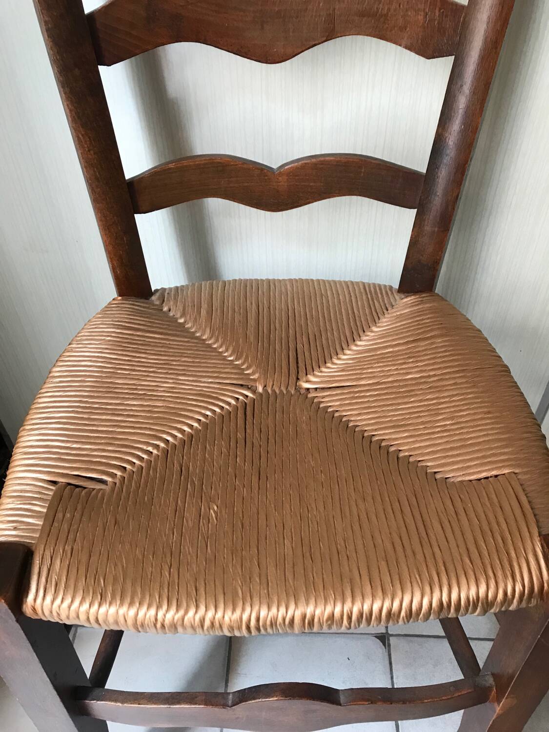 Wooden and straw chairs