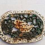 Cast iron dish underside with duck