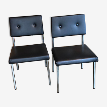 Pair of vintage chairs completely renovated in black skaï and metal legs