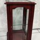 Showcase low glass beveled exotic wood
