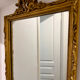 Small gilded rococo mirror antique