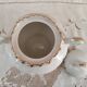 White porcelain sugar bowl decoration in relief and green and gold frieze