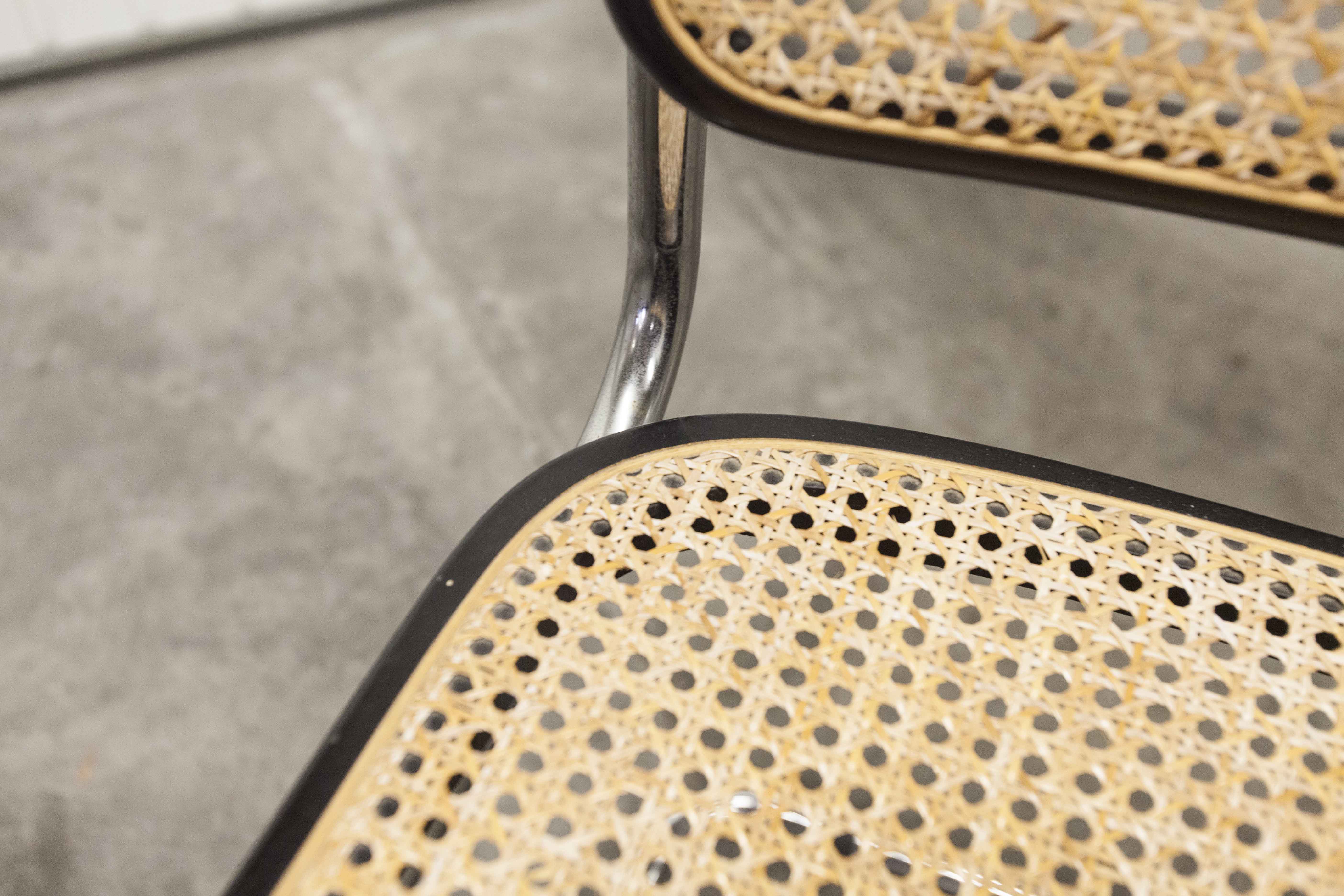 Pair of black Breuer b32 chairs and cannage
