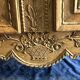 19th-century Norman wedding armoire, with bouquets of flowers and doves.