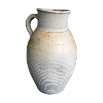 Beige terracotta jug