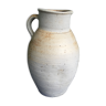 Beige terracotta jug