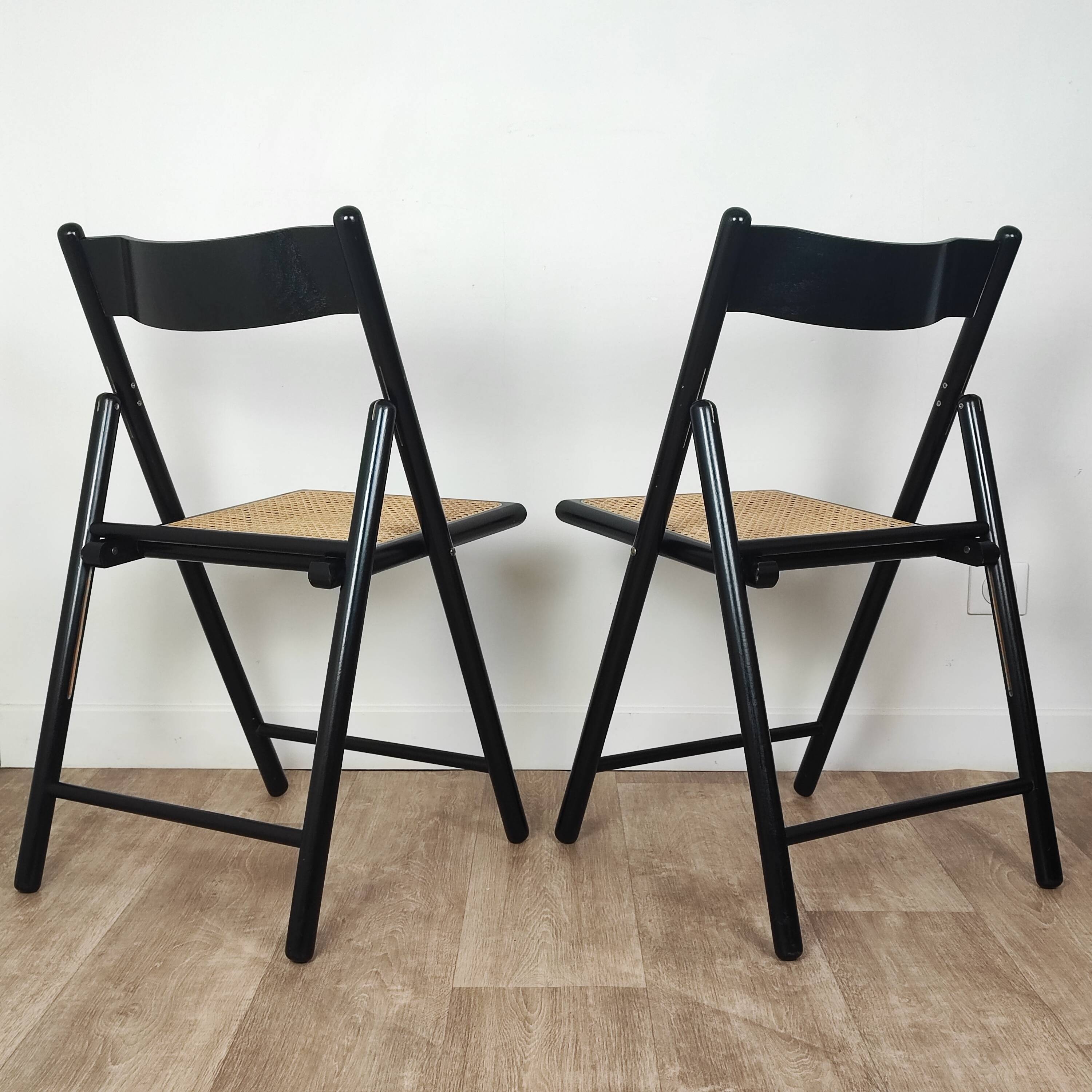 Pair of wooden and rattan folding chairs