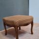 Pouf upholstered legs cambered in mahogany