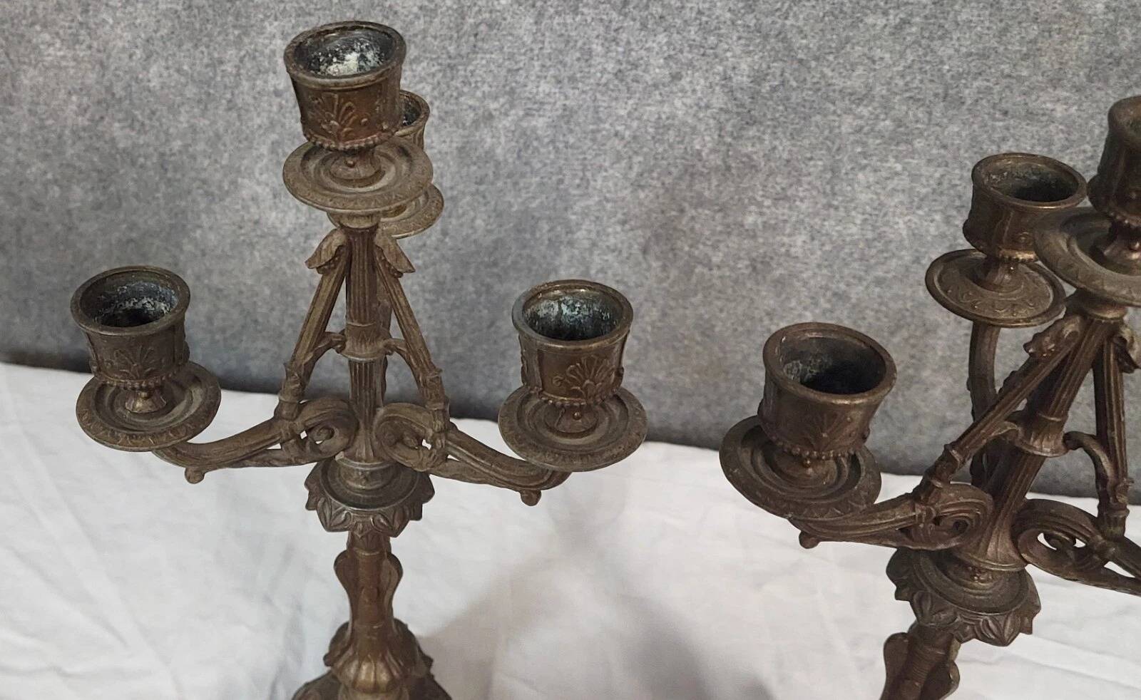 Pair of antique candelabra in patinated bronze spelter