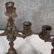 Pair of antique candelabra in patinated bronze spelter