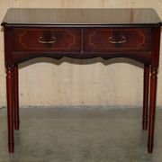 Small console with two drawers in hardwood finish.