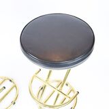 Pair of high brass stools