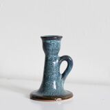 Antique candle holder in glazed ceramic