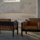 Pair of wooden and leather armchairs by Rud Thygesen & Johnny Sørensen, 1970s.