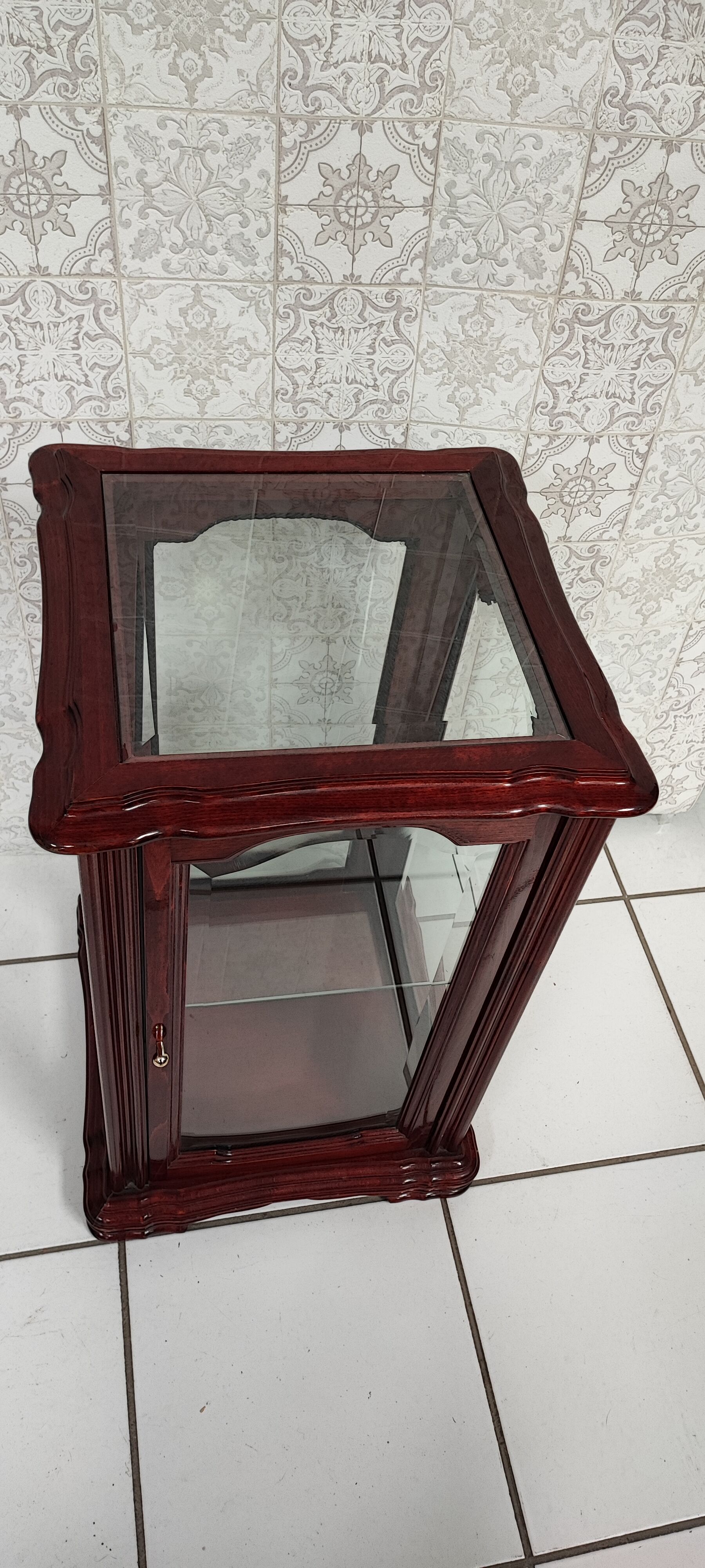 Showcase low glass beveled exotic wood