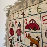 Vintage alphabet wall rug