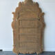 Large mirror with carved and gilded wooden frame, in Regency style.
