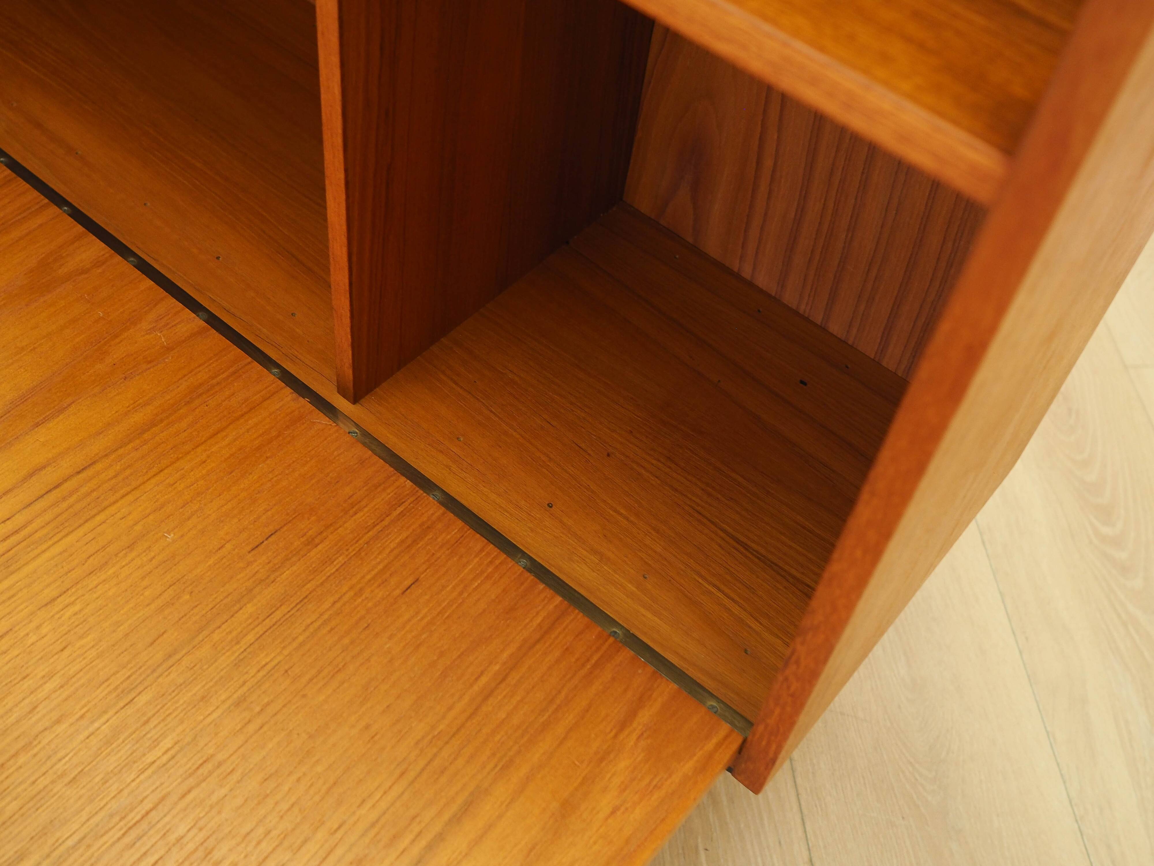 Danish teak-veneered bookcase with a bar and adjustable shelves, 1970s.