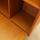 Danish teak-veneered bookcase with a bar and adjustable shelves, 1970s.