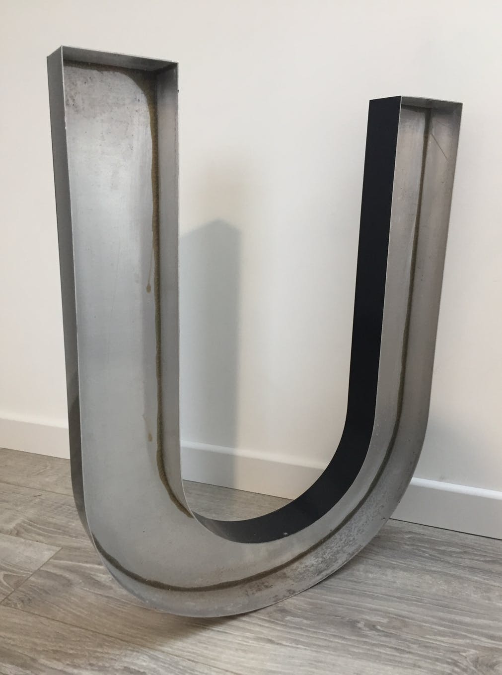 Metal sign letter "U"