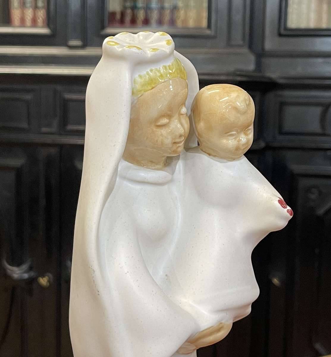 Virgin and child in quimper faience with ivory background by bel delecourt
