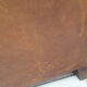 Paire de fauteuils club en cuir marron