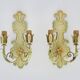Pair of Italian wall lights in cream-colored sheet metal. 1970s