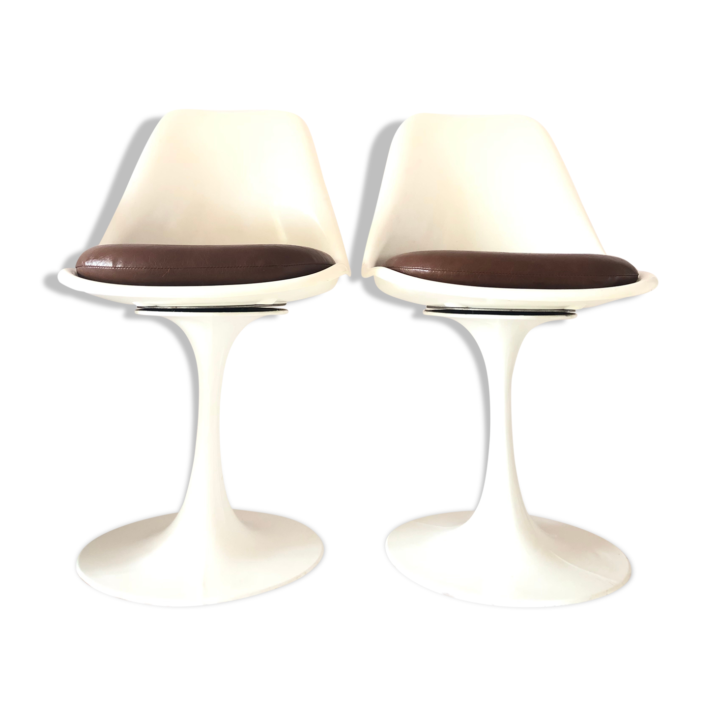 Pair of vintage tulip foot swivel chairs