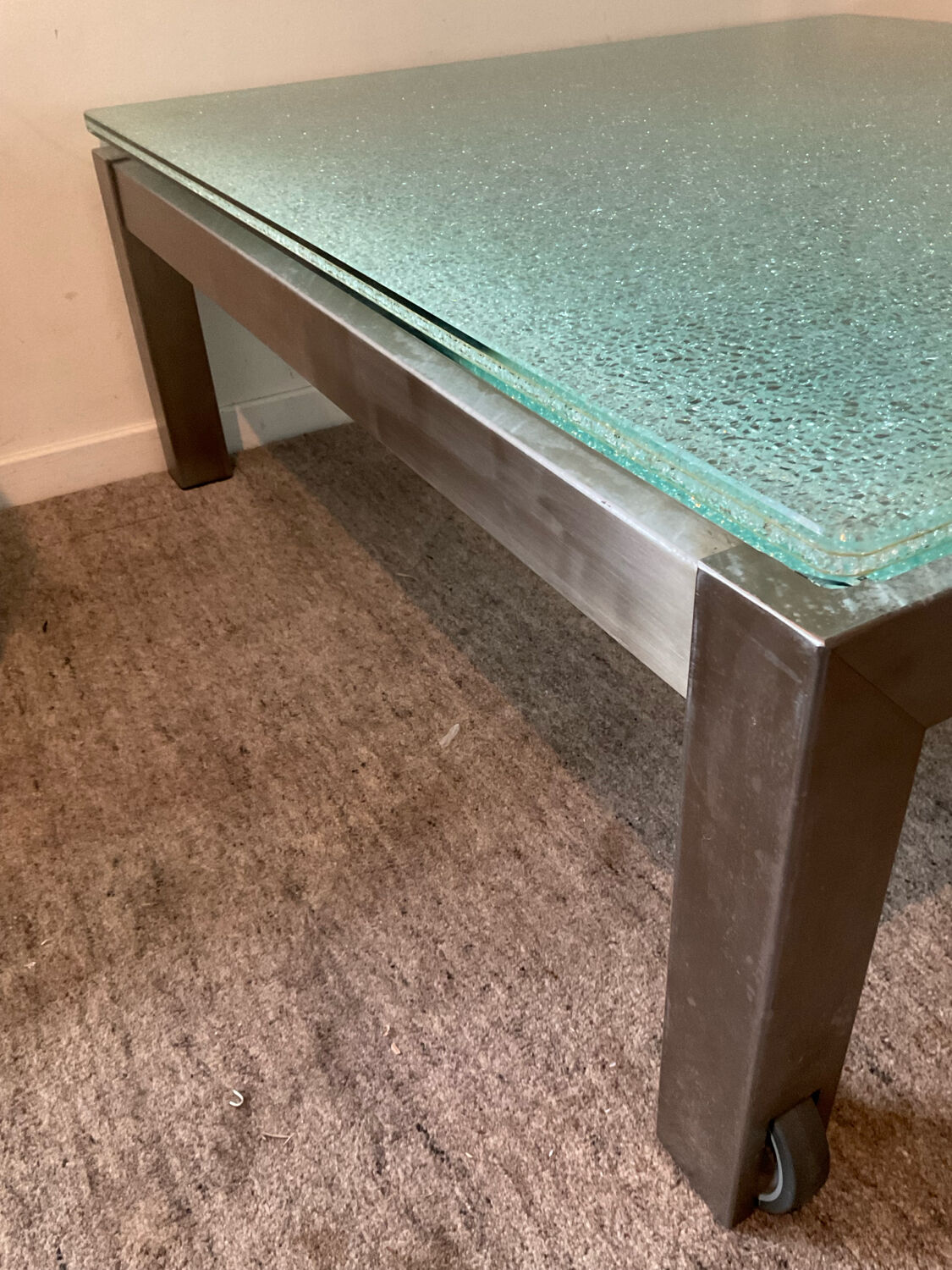 Designer garden coffee table in tempered glass and stainless steel
