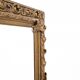 Miroir ancien dans un cadre richement décoré, France.