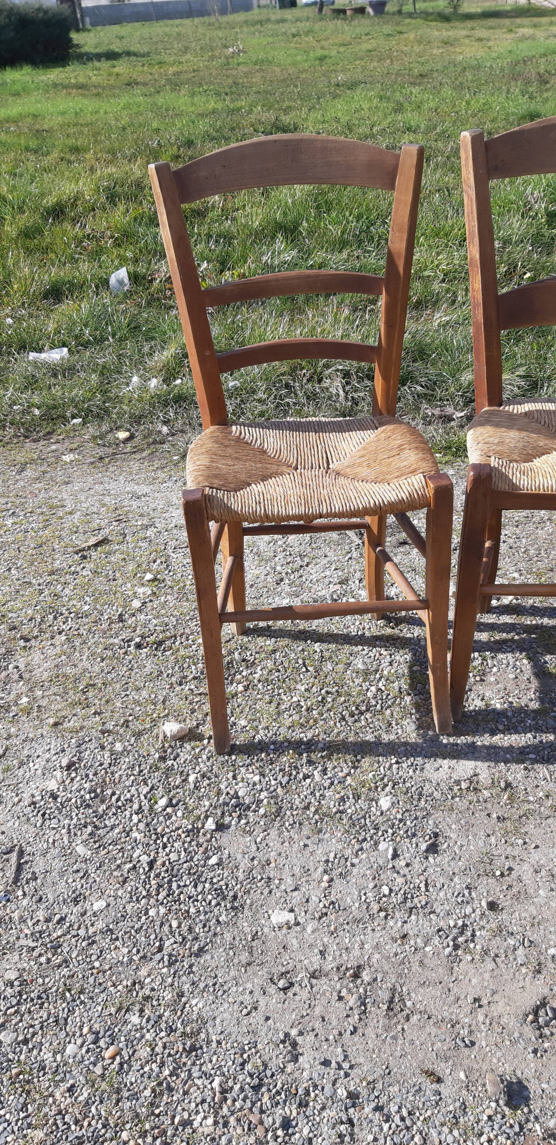 6 antique and mismatched mulched chairs