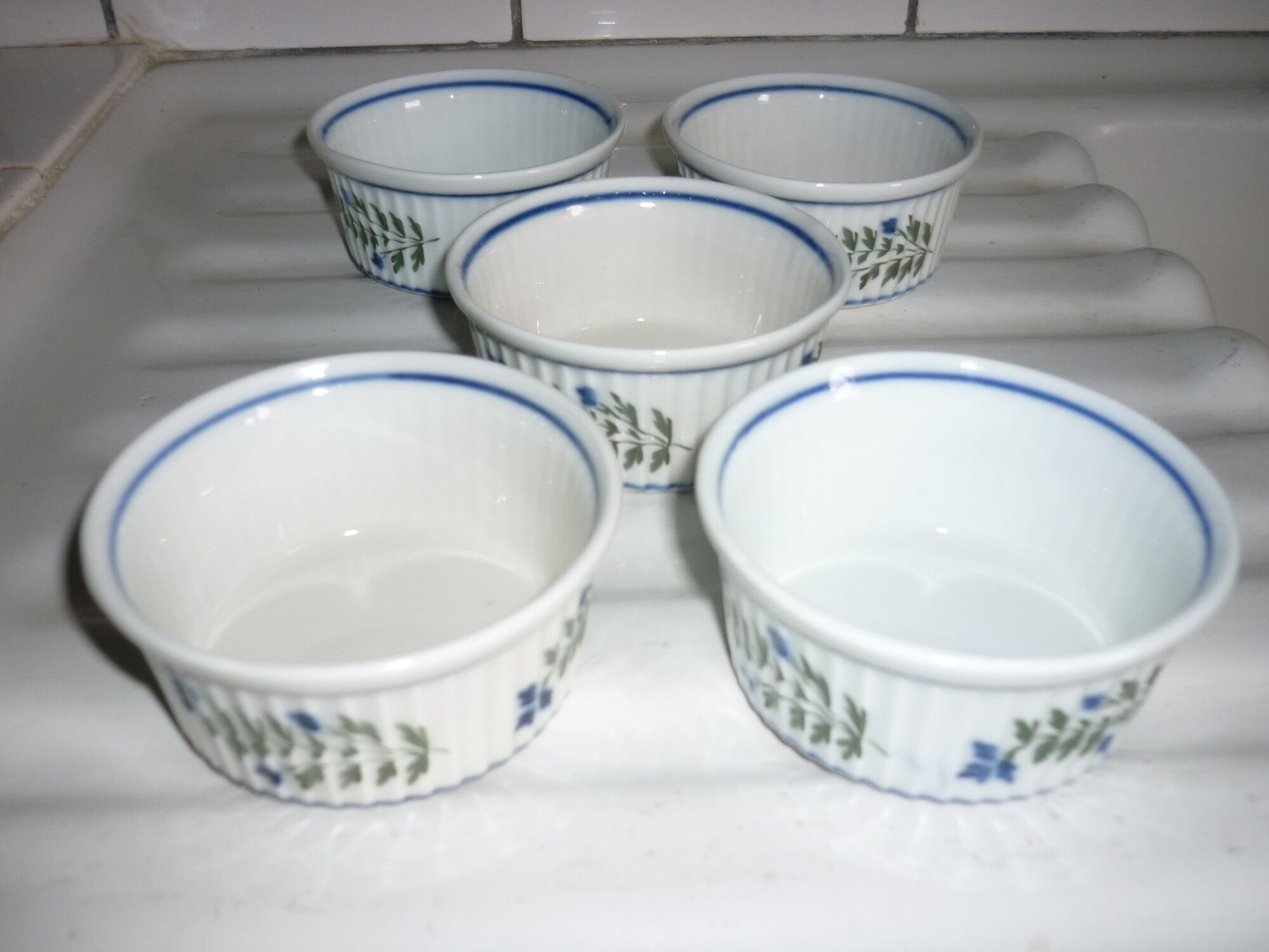 5 porcelain ramekins with smoother decoration and blue flowers and foliage
