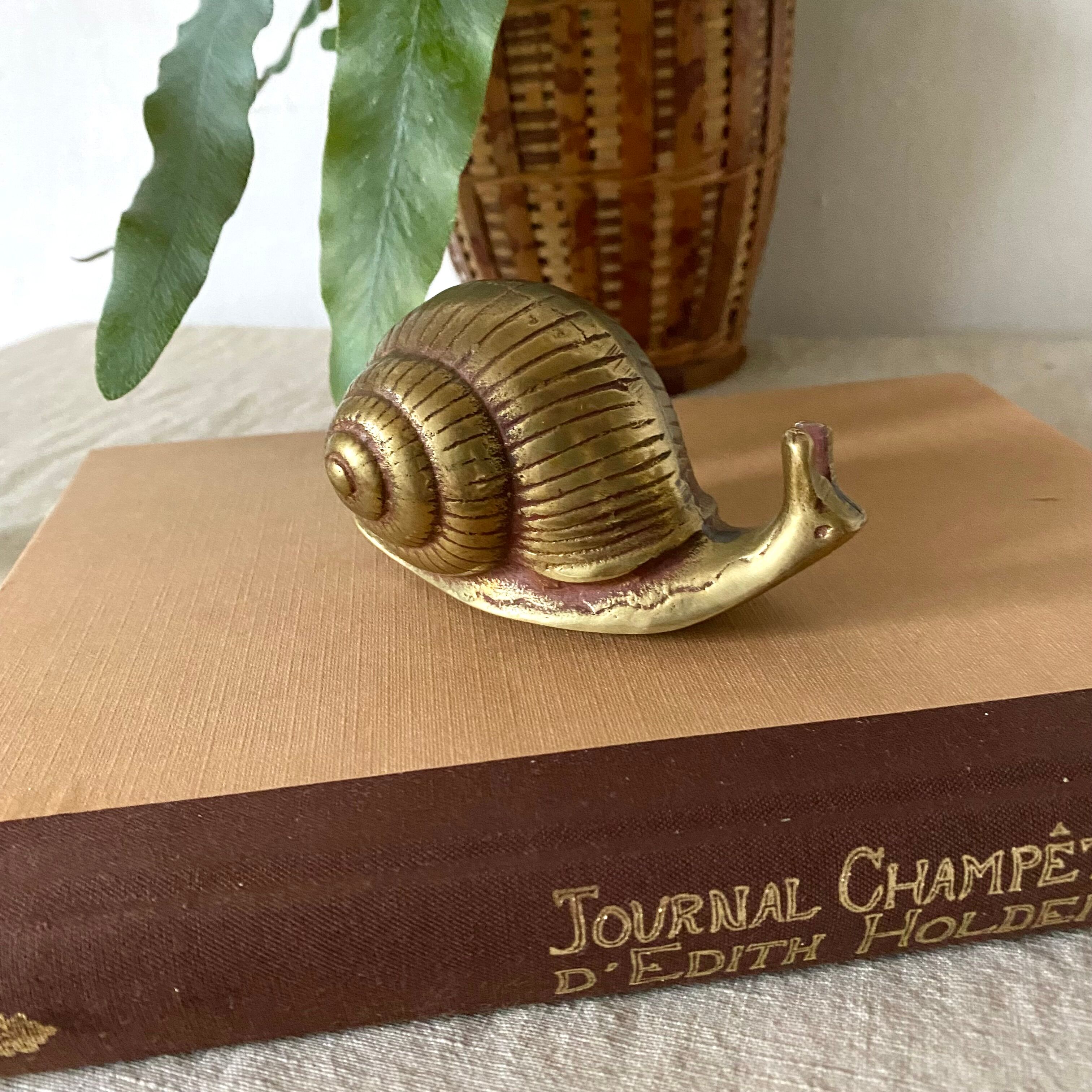 Golden brass snail