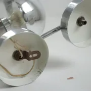 Pair of European mid-century chrome wall sconces with mirrored globe shades