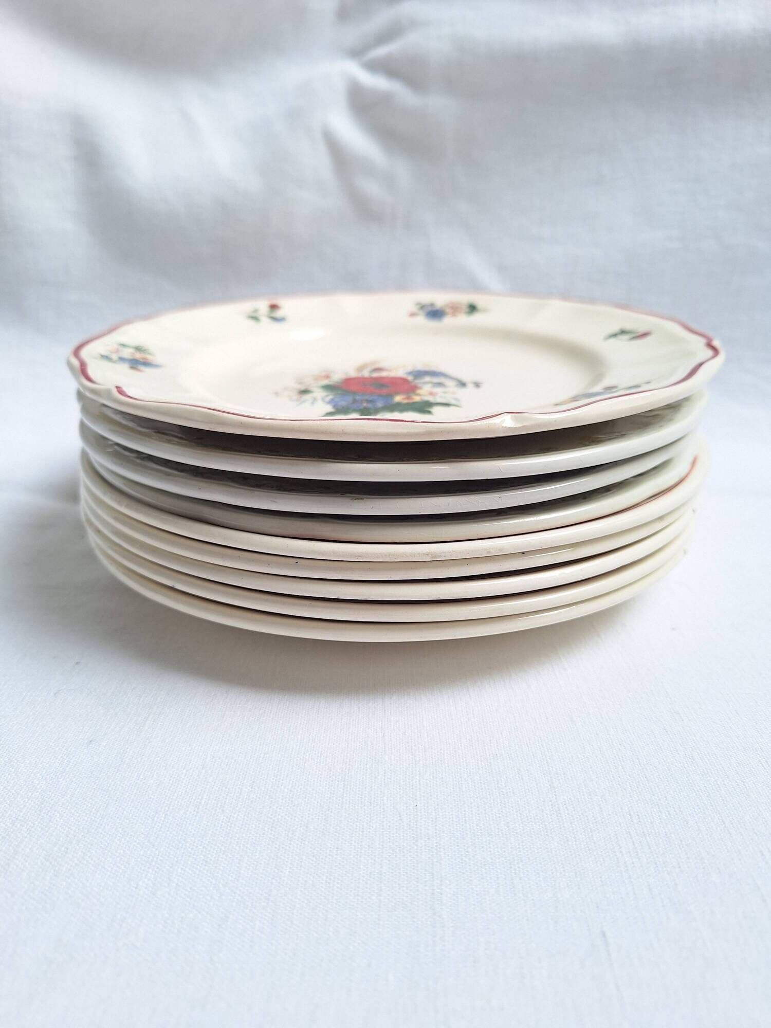 Vintage flower dessert plates from Sarreguemines, Longwy, and Lunéville.