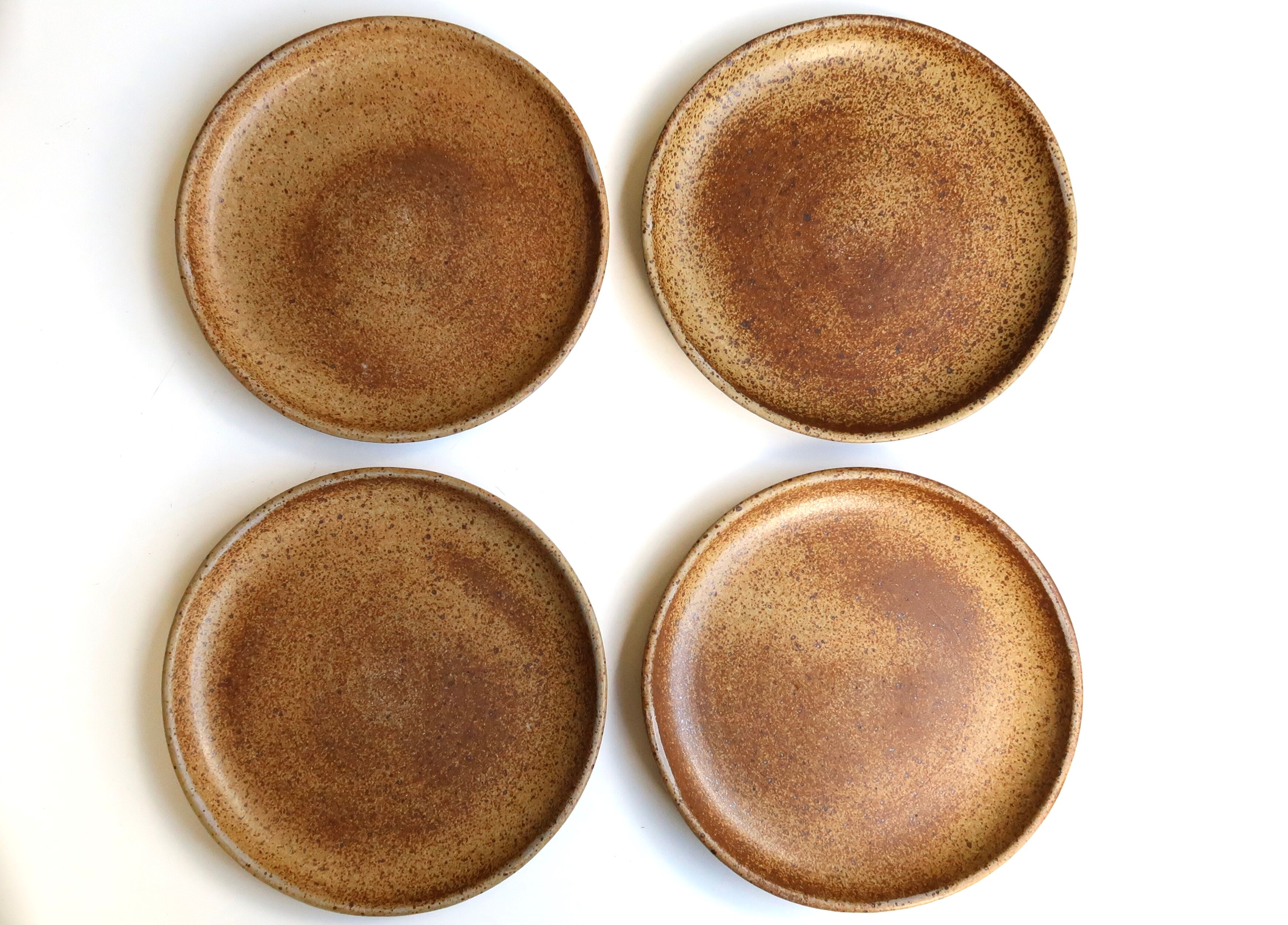 Set of 4 flat sandstone plates, 70s