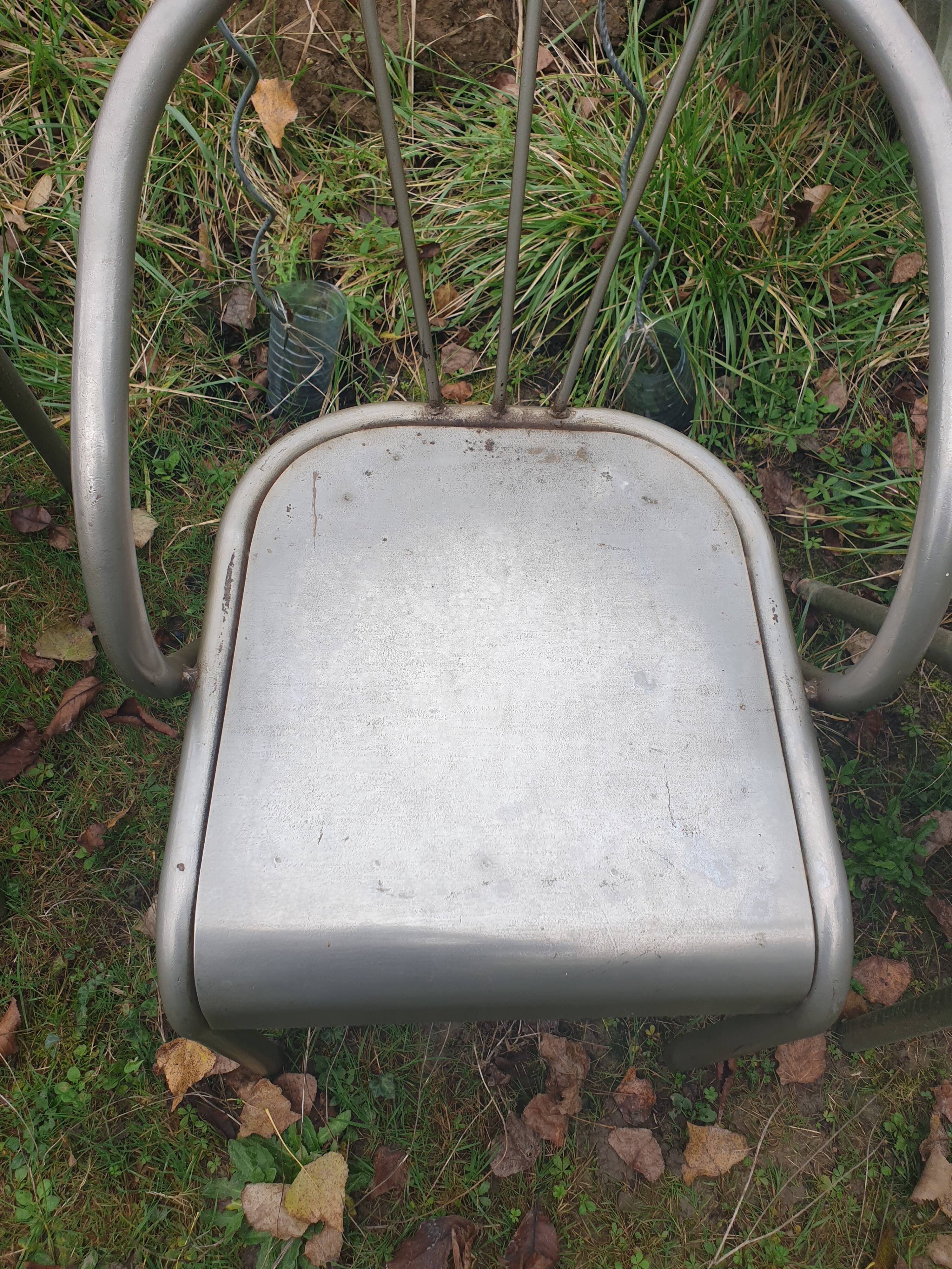 4 seventies welded tubular steel armchairs