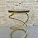 Spring-shaped end table in gold metal