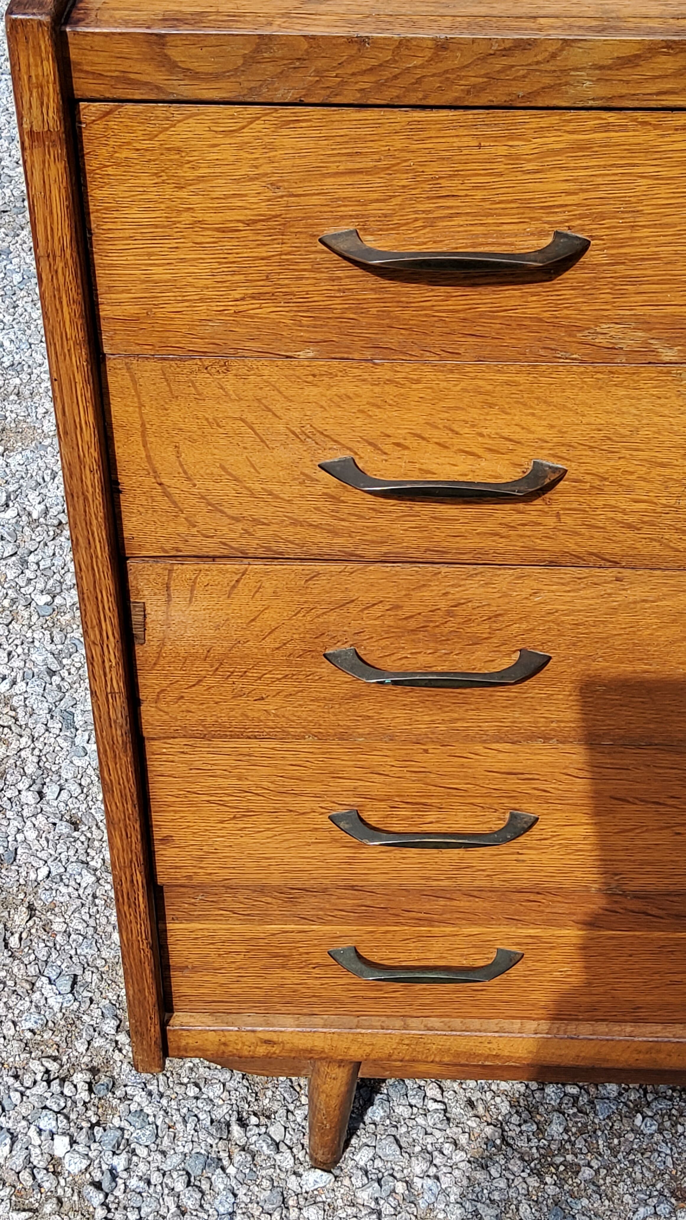Chest of drawers of the 50s in golden blond oak 5 drawers conical feet
