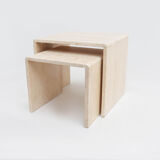 Set of two travertine side tables