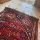 Large antique Oriental hallway carpet made of hand-knotted wool.