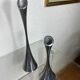 Pair of designer candle holders in stainless steel